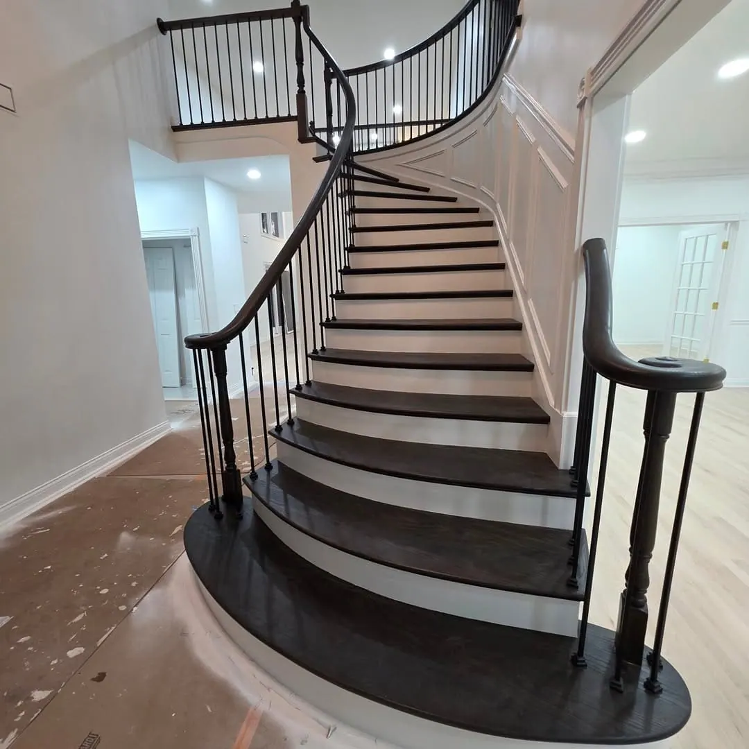 Large house renovation with curved staircase — Sutton, London