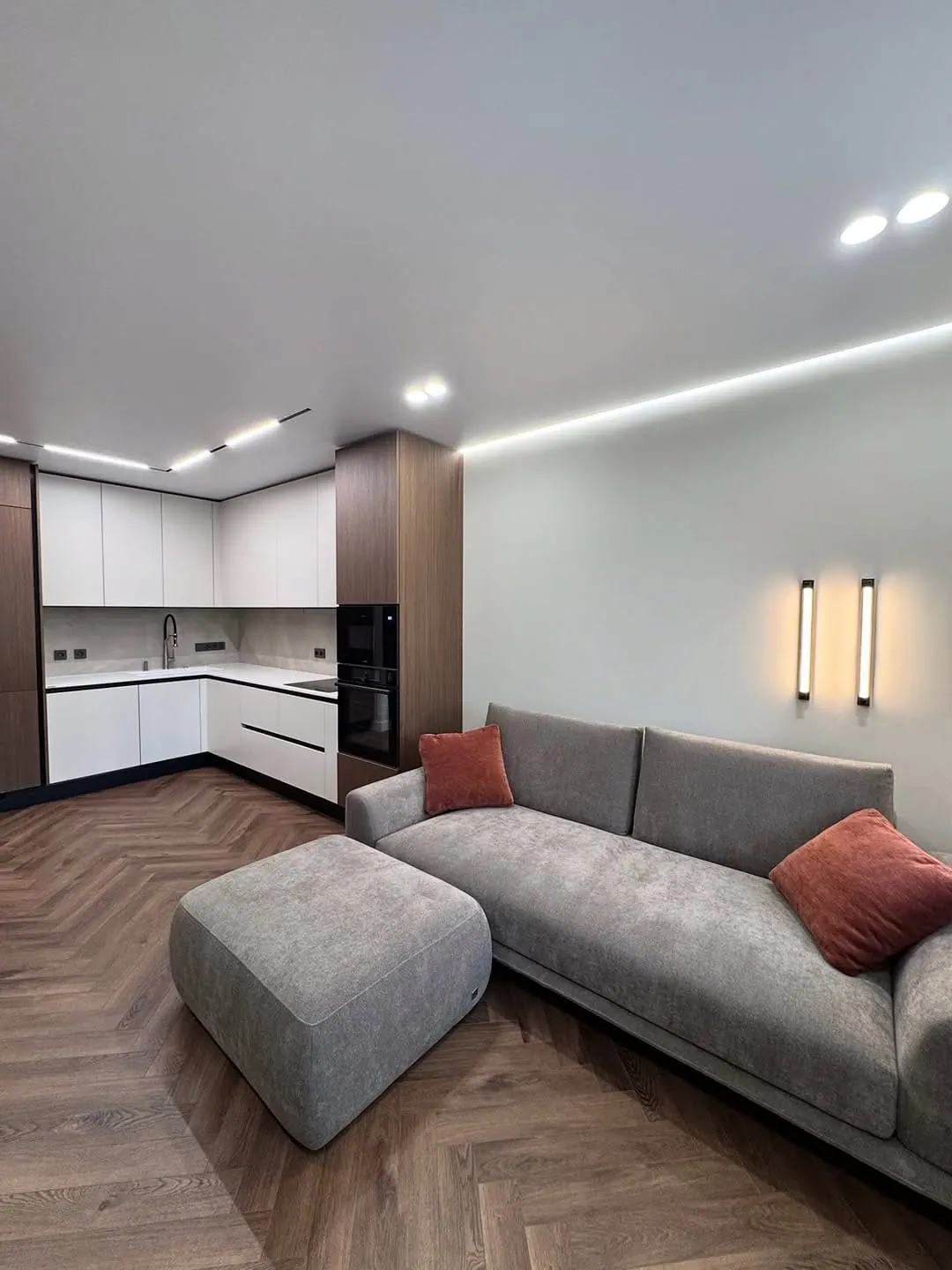 Open-plan flat renovation with herringbone — Chelsea, London